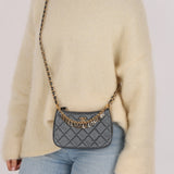 Chanel 2021 Metallic Logo Charms Quilted Pochette