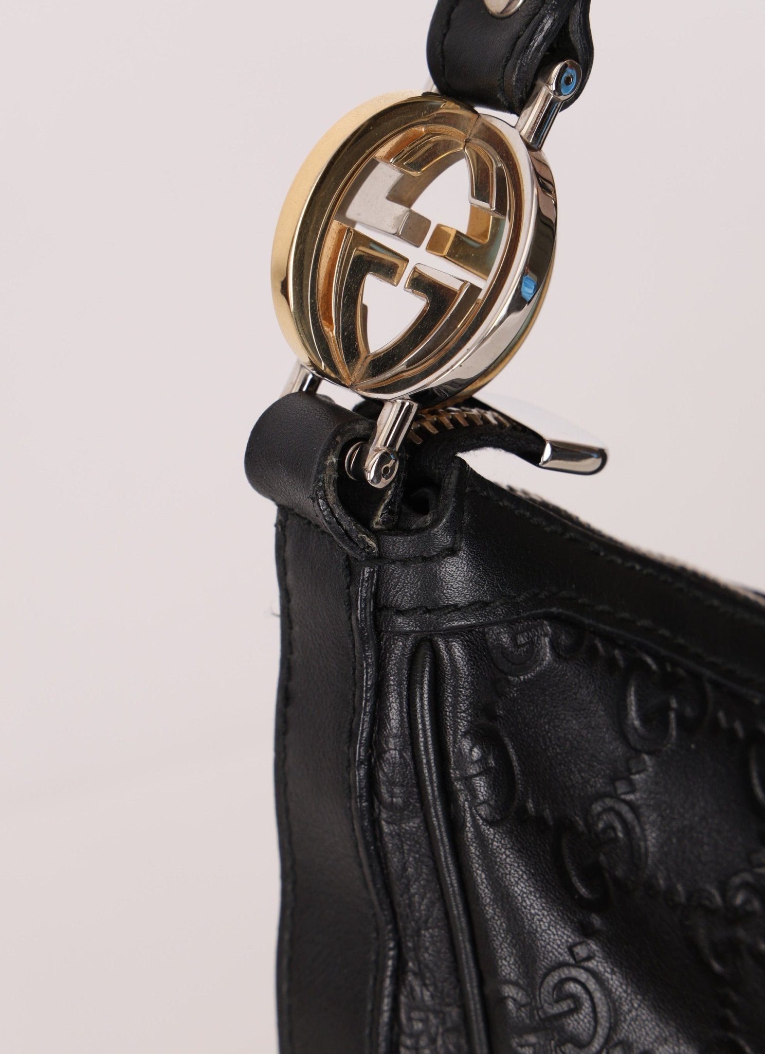 Gucci Monogram Embossed Leather Hobo - FashioNica