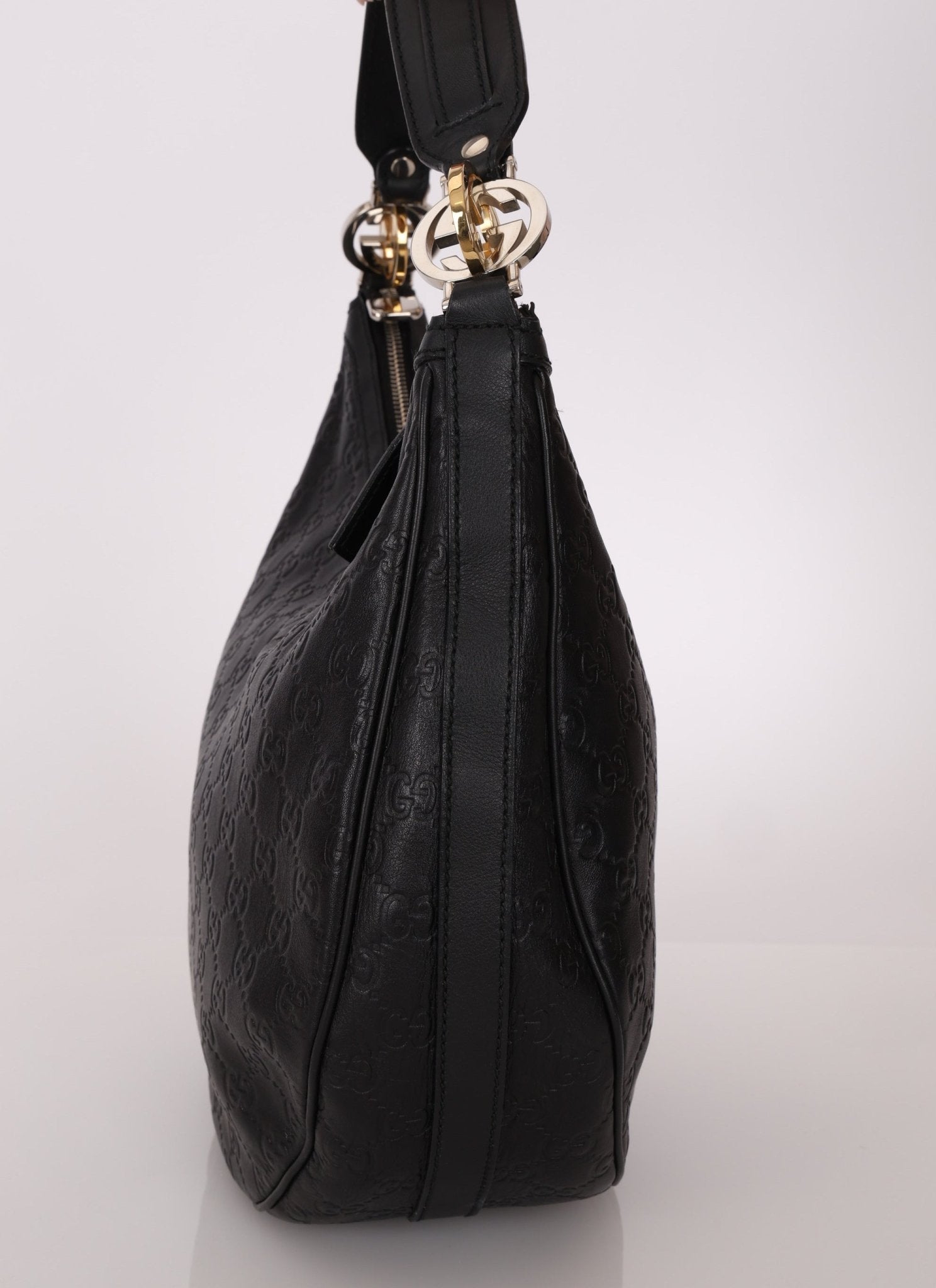 Gucci Monogram Embossed Leather Hobo - FashioNica