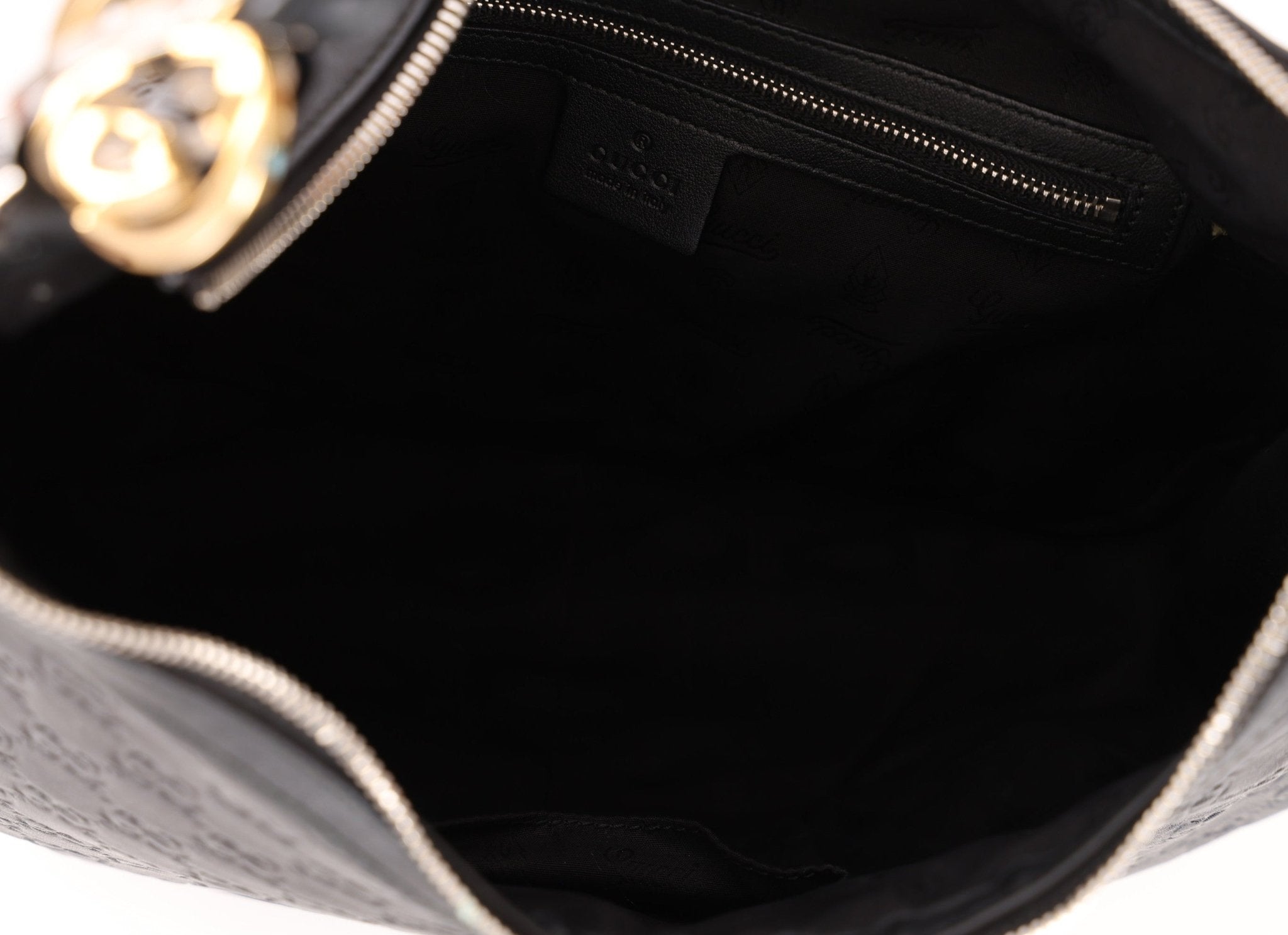 Gucci Monogram Embossed Leather Hobo - FashioNica