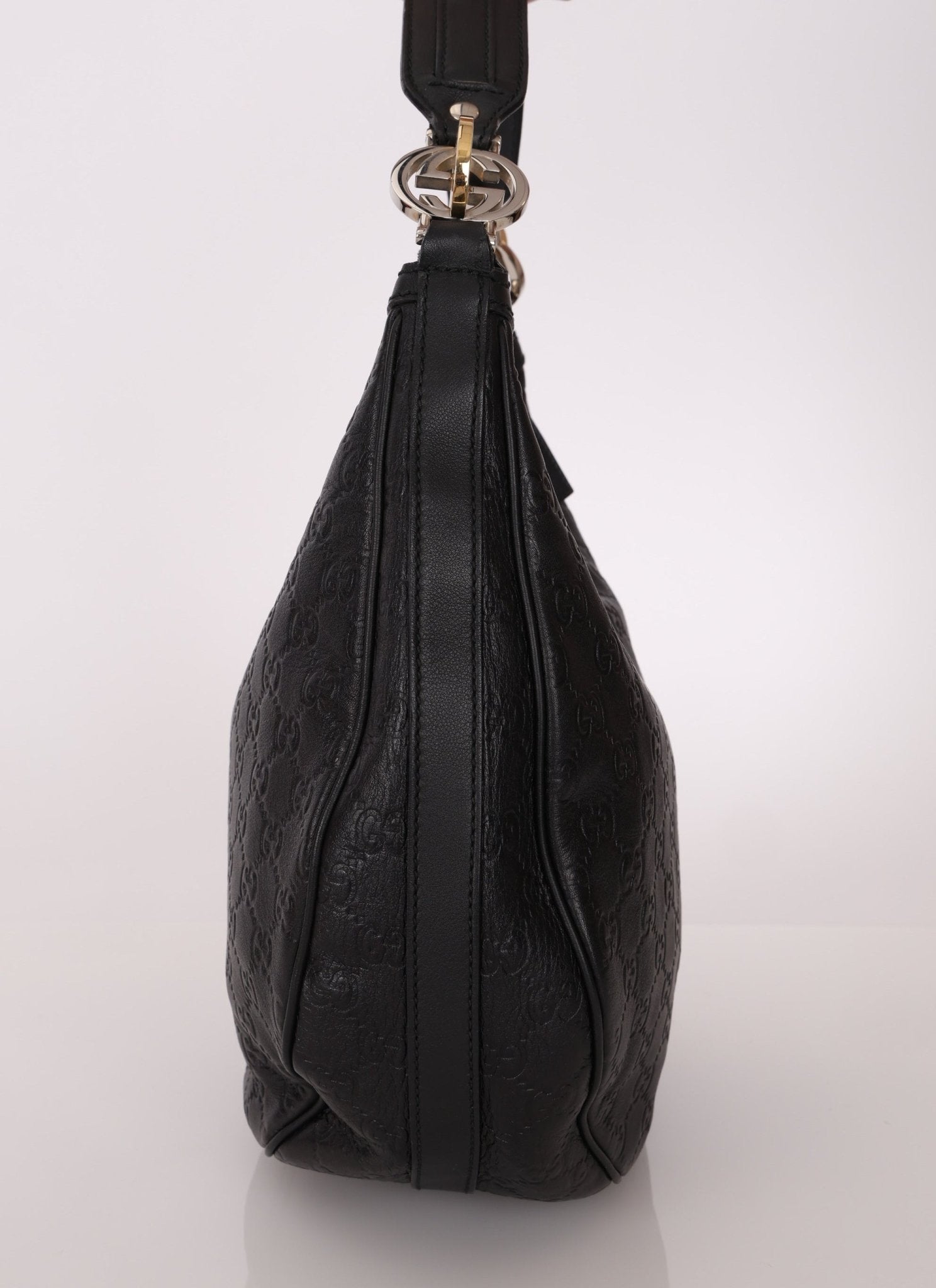 Gucci Monogram Embossed Leather Hobo - FashioNica