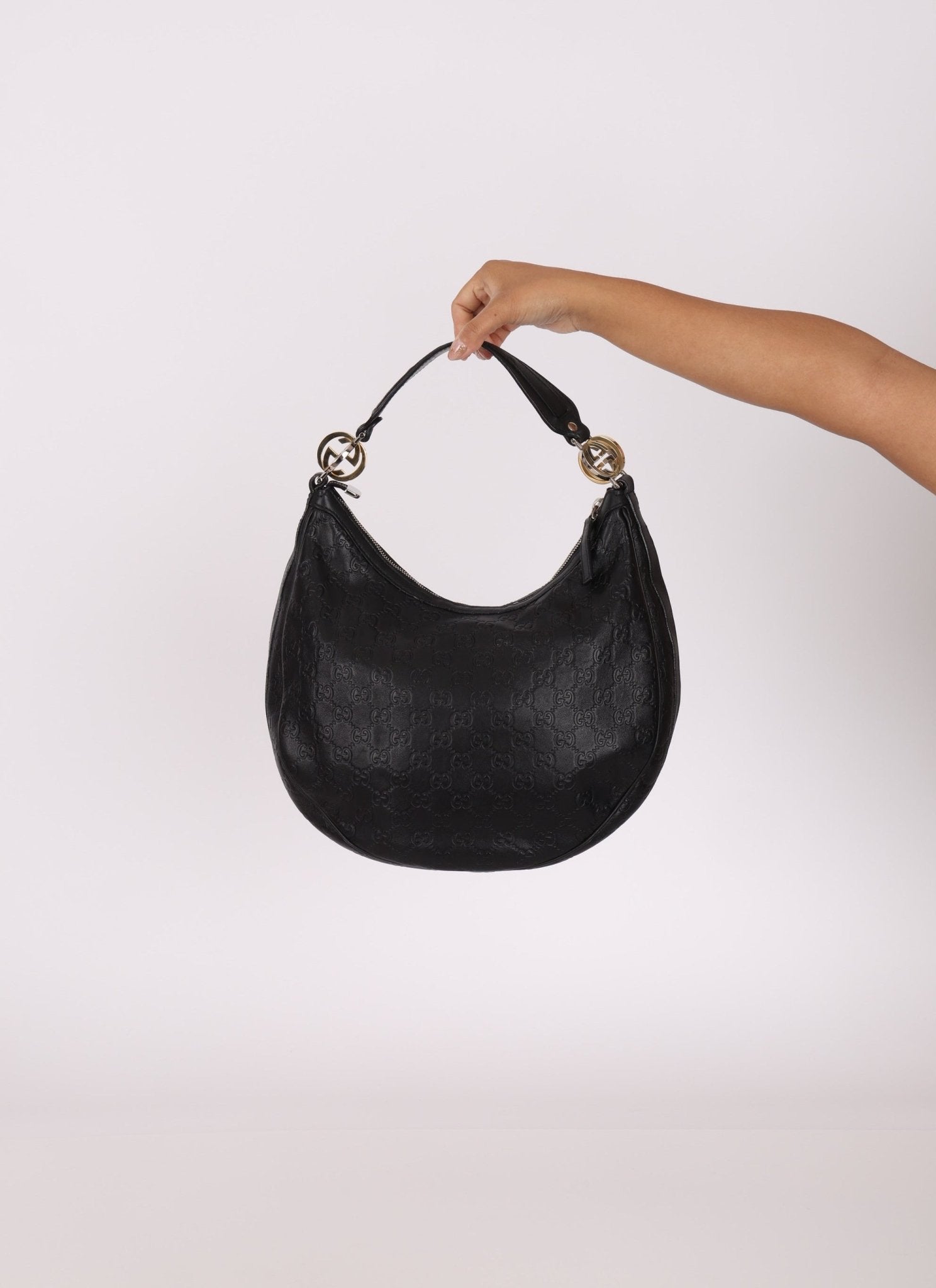 Gucci Monogram Embossed Leather Hobo - FashioNica