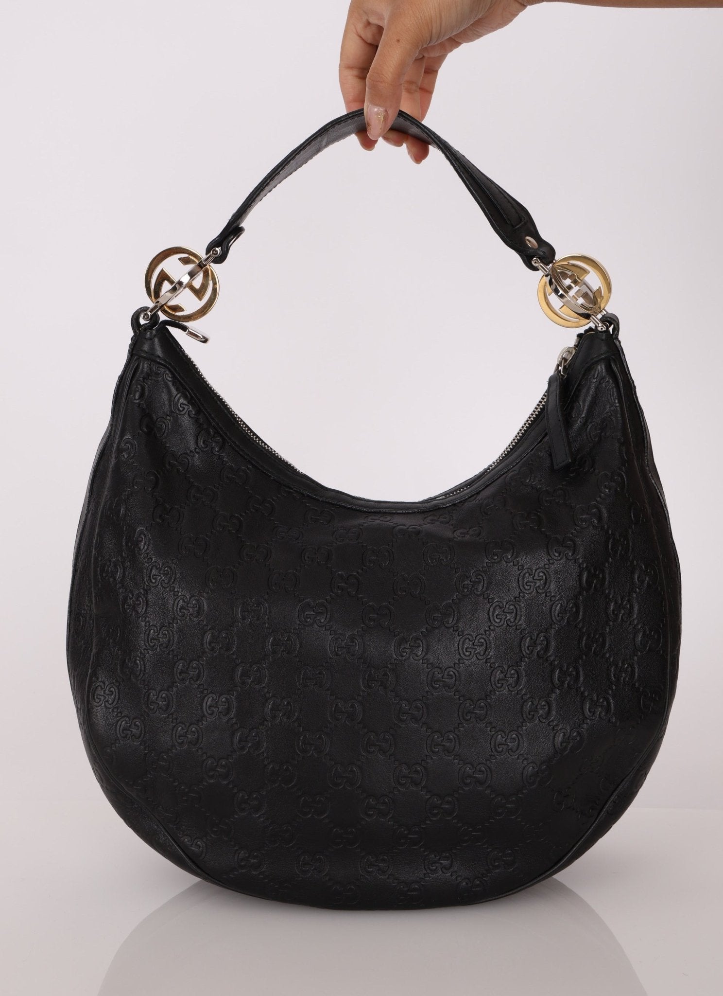 Gucci Monogram Embossed Leather Hobo - FashioNica