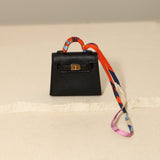 Hermès 2023 Micro Kelly Noir Tadelakt Twilly Bag Charm