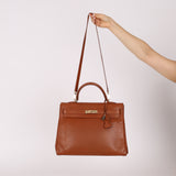 Limited Edition Hermès 2012 Fauve Tadelakt Ghillies Kelly Retourne 35 GHW
