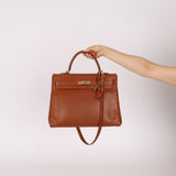 Limited Edition Hermès 2012 Fauve Tadelakt Ghillies Kelly Retourne 35 GHW