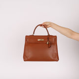Limited Edition Hermès 2012 Fauve Tadelakt Ghillies Kelly Retourne 35 GHW