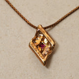 18K Yellow Gold Ruby and Diamond Triple Row Pendant Necklace