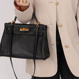 Hermès 2009 Noir Swift Kelly 32 GHW