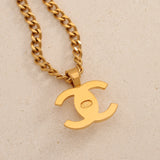 Chanel 1997 Gold Double Turnlock Pendant Necklace