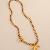 Chanel 1997 Gold Double Turnlock Pendant Necklace