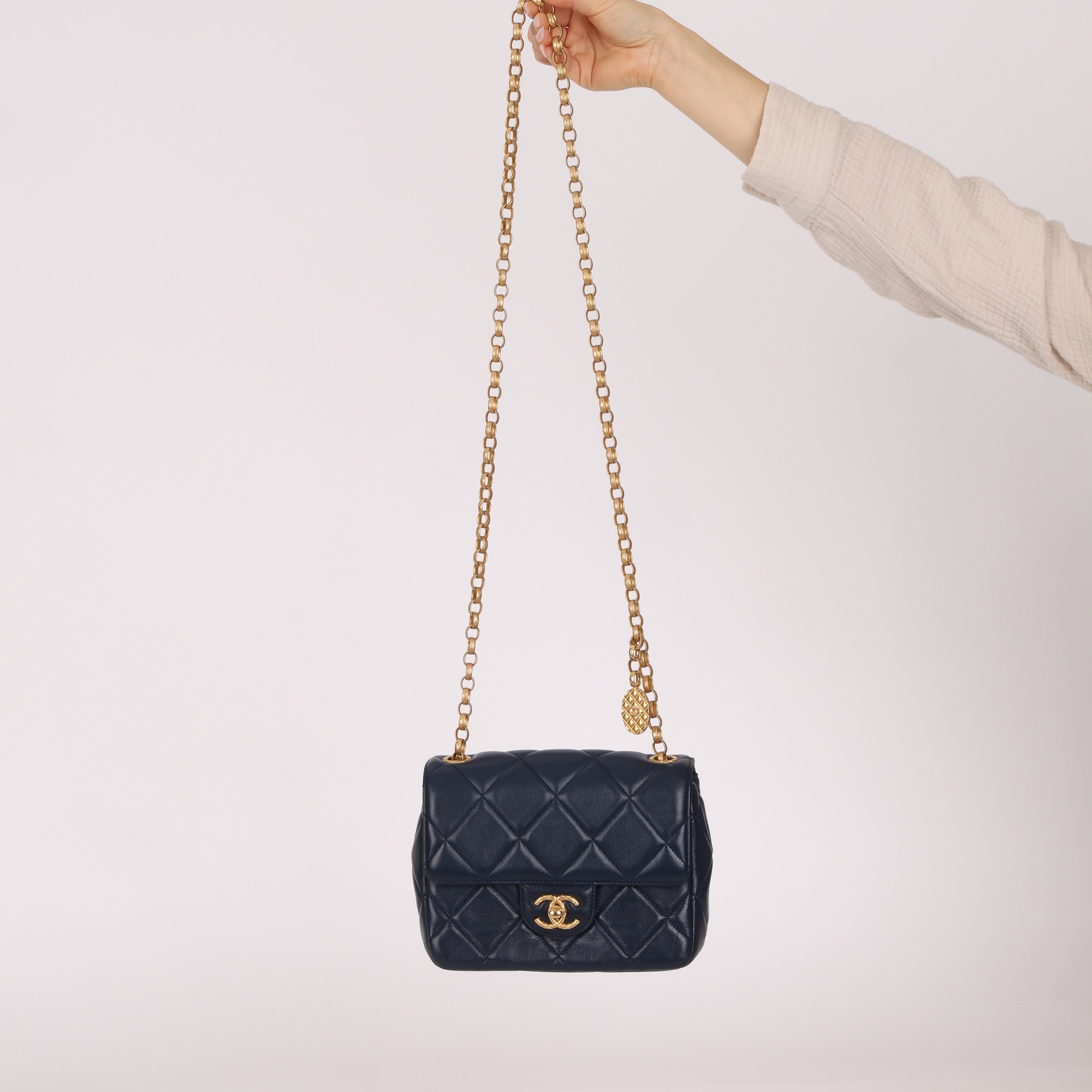 Chanel 2024 Navy Quilted Lambskin Bijoux Logo Chain Mini Square Flap