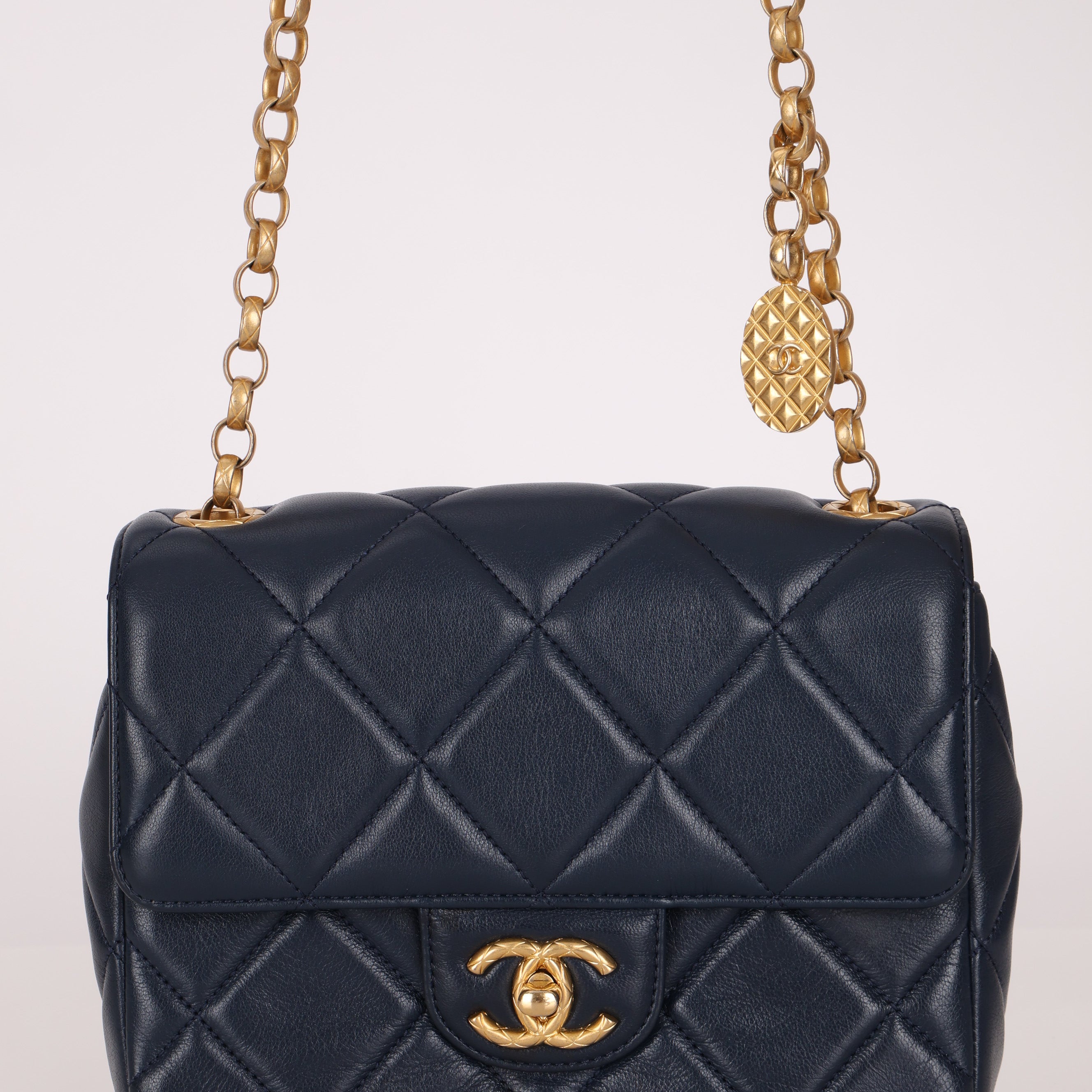Chanel 2024 Navy Quilted Lambskin Bijoux Logo Chain Mini Square Flap