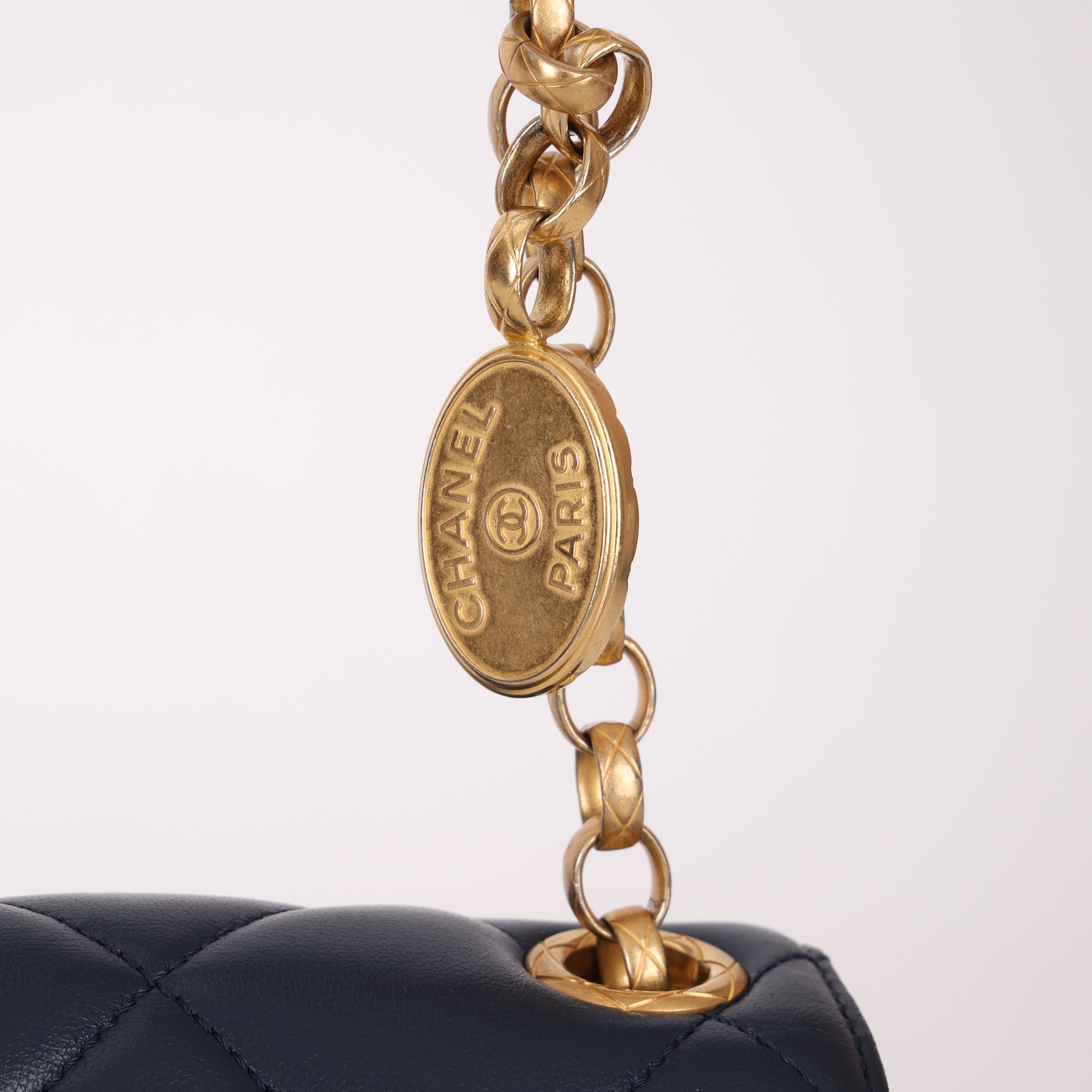 Chanel 2024 Navy Quilted Lambskin Bijoux Logo Chain Mini Square Flap
