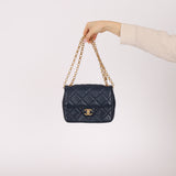 Chanel 2024 Navy Quilted Lambskin Bijoux Logo Chain Mini Square Flap