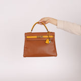 Limited Edition Hermès 1991 Gold and Jaune Ambre Courchevel Kelly 32 Retourne GHW