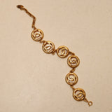 Chanel 1982 CC Coin Bracelet 24k GP
