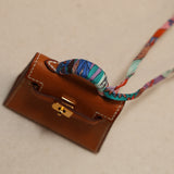 Ultra-Rare Hermès 2020 Toffee Peau Porc Micro Twilly Kelly GHW