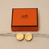 Hermès Gold Clou de Selle Clip-On Earrings