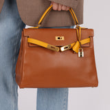 Limited Edition Hermès 1991 Gold and Jaune Ambre Courchevel Kelly 32 Retourne GHW