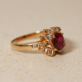 1980's 18K Yellow Gold Ruby and Diamond Askew Halo Ring, Size US 6.25