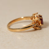 1980's 18K Yellow Gold Ruby and Diamond Askew Halo Ring, Size US 6.25