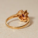1980's 18K Yellow Gold Ruby and Diamond Askew Halo Ring, Size US 6.25
