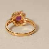 1980's 18K Yellow Gold Ruby and Diamond Askew Halo Ring, Size US 6.25