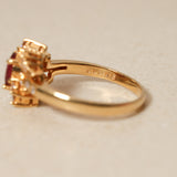 1980's 18K Yellow Gold Ruby and Diamond Askew Halo Ring, Size US 6.25