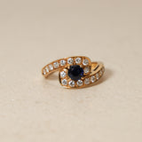 Mouawad 1990's 18K Yellow Gold and Sapphire Diamond Bypass Ring, Size US 6