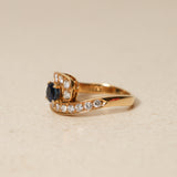 Mouawad 1990's 18K Yellow Gold and Sapphire Diamond Bypass Ring, Size US 6