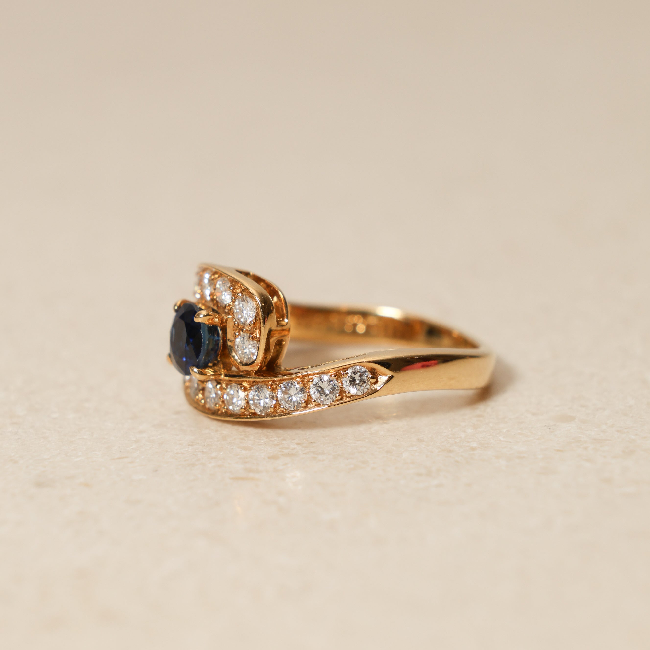Mouawad 1990's 18K Yellow Gold and Sapphire Diamond Bypass Ring, Size US 6
