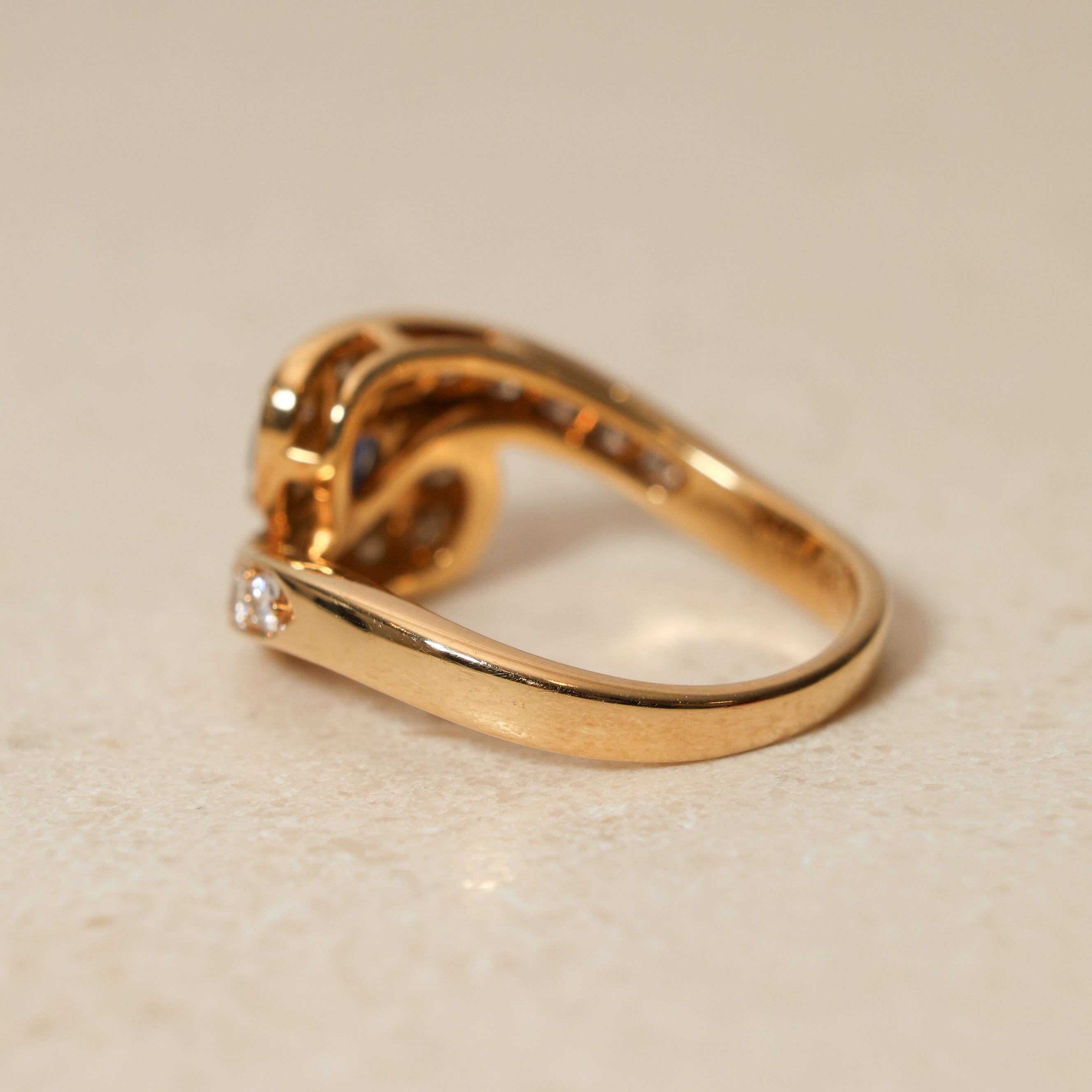 Mouawad 1990's 18K Yellow Gold and Sapphire Diamond Bypass Ring, Size US 6