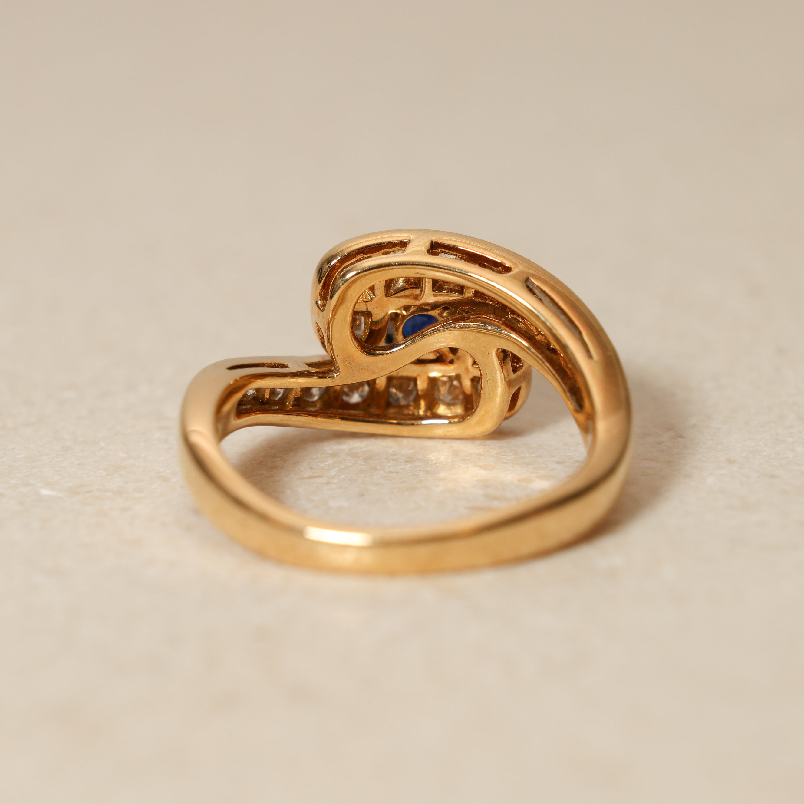 Mouawad 1990's 18K Yellow Gold and Sapphire Diamond Bypass Ring, Size US 6