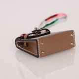 Hermès 2020 Etoupe Tadelakt Micro Kelly Twilly Bag Charm