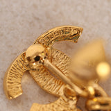 Chanel 1990s CC Cocomark Clip-On Earrings 24K GP