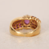 Vintage 1980s 18K Yellow Gold Ruby and Diamond Woven Motif Solitaire Ring, Size US 5