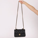 Chanel 2025 Caviar Chain Top Handle Turnlock Mini Flap