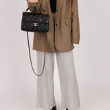 Chanel 2025 Caviar Chain Top Handle Turnlock Mini Flap