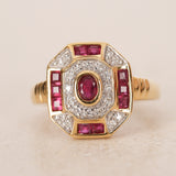 Vintage 1990s 18K Yellow Gold Ruby and Illusion Set Diamond Crest Ring, Size US 6