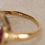 Vintage 1990s 18K Yellow Gold Ruby and Illusion Set Diamond Crest Ring, Size US 6