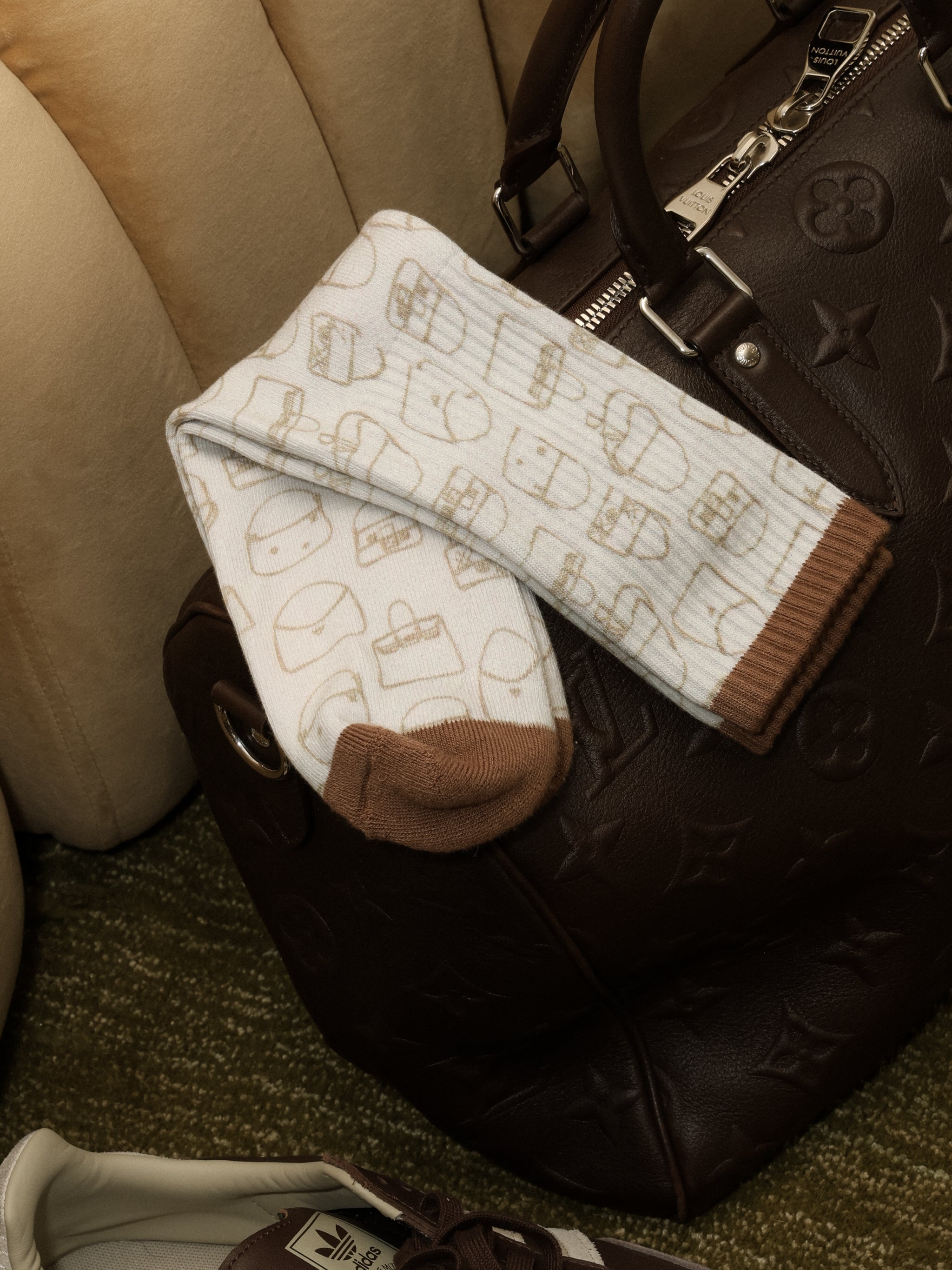 Pair of socks with a pattern on a brown bag