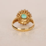 Vintage 1970s 18K Yellow Gold Diamond and Emerald Spiral Halo Ring, Size US 6