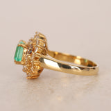 Vintage 1970s 18K Yellow Gold Diamond and Emerald Spiral Halo Ring, Size US 6