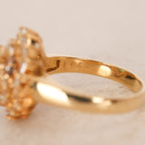 Vintage 1970s 18K Yellow Gold Diamond and Emerald Spiral Halo Ring, Size US 6