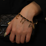 Chanel 1996 Leather and Chain Logo Charms Bracelet