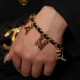 Chanel 1996 Leather and Chain Logo Charms Bracelet