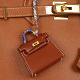 Hermès 2021 Gold Tadelakt Micro Kelly Twilly Bag Charm GHW