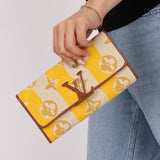 Louis Vuitton Striped Canvas Capucines Long Wallet