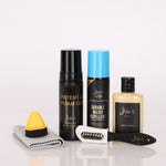 Collection of leather grooming products including bottles, a brush, and a cloth on a white background